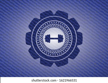big dumbbell icon inside emblem with jean high quality background