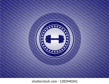 big dumbbell icon inside jean background