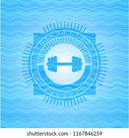 big dumbbell icon inside light blue water wave badge.