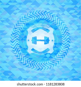 big dumbbell icon inside light blue mosaic emblem