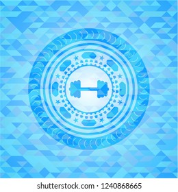 big dumbbell icon inside light blue emblem with triangle mosaic background