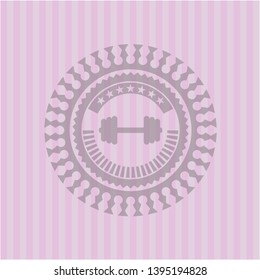 big dumbbell icon inside pink emblem