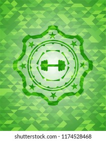 big dumbbell icon inside realistic green emblem. Mosaic background