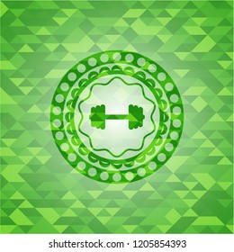 big dumbbell icon inside realistic green emblem. Mosaic background