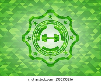 big dumbbell icon inside realistic green emblem. Mosaic background
