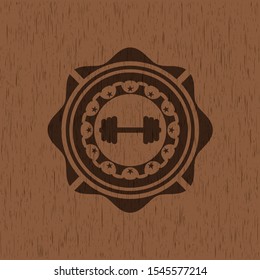 big dumbbell icon inside retro wood emblem