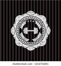 big dumbbell icon inside silver badge