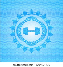 big dumbbell icon inside water concept badge background.