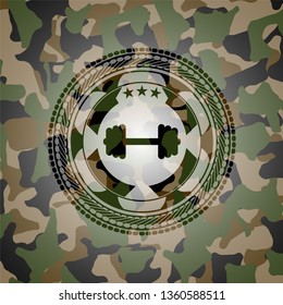 big dumbbell icon on camouflaged texture