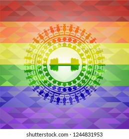 big dumbbell icon on mosaic background with the colors of the LGBT flag