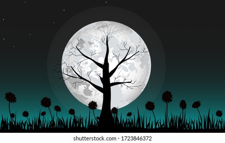 Big full moon and silhouette a dead tree