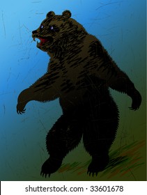 The big furious dark bear stands on hinder legs