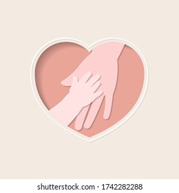 Big hand holding small one represent mother and baby, in pink heart shaped frame paper art greeting card style