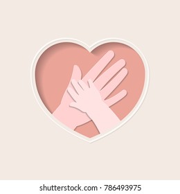 Big hand holding small one represent mother and baby, in pink heart shaped frame paper art greeting card