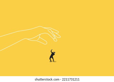 big hand trying to catch on his small worker or businessman. concept of under pressure. risk, financial, and tax.