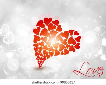 Big heart shape made with many red small heart shape on abstract background. EPS 10. can be use as banner, flyer, poster, greeting or gift card.