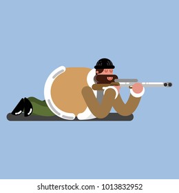 Big hunter lies on the flor and ready to shoot