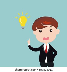 Big idea concept with man and lightbulb. Symbol of having an idea with businessman pointing at light bulb
