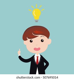 Big idea concept with man and lightbulb. Symbol of having an idea with businessman pointing at light bulb
