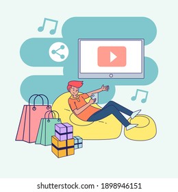 Big isolated Young man lying on a yellow-colored couch playing video and music on youtube. Cartoon character vector illustration.