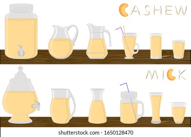 Big kit different types pitcher, cashew milk in jugs various size. Pitcher consisting of organic plastic jugs for fluid cashew milk. Jugs of cashew milk it pitcher standing on wooden kitchen table.