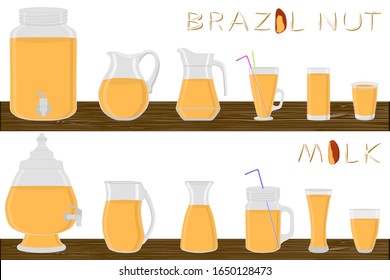 Big kit different types pitcher, brazil nut milk in jugs various size. Pitcher consisting of organic plastic jugs for fluid brazil nut milk. Jugs of brazil nut milk it pitcher standing on wooden table
