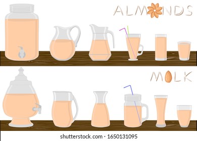 Big kit different types pitcher, almonds milk in jugs various size. Pitcher consisting of organic plastic jugs for fluid almonds milk. Jugs of almonds milk it pitcher standing on wooden kitchen table.