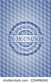 Big Motivation blue hexagon emblem.
