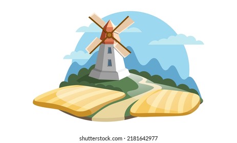 Große alte Windmühle unter gelben Weizenfeldern auf Berghintergrund.