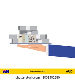 Big pile of money on the tray. Winning the jackpot.  Australian dollar banknote.