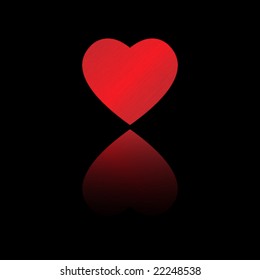 big red dappled heart with reflection on black background