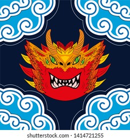 The big red head of the Chinese dragon in the sky. Dragon with two pairs of eyes, horns and white teeth.