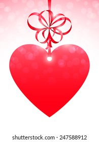 Big red heart and bow on bright background