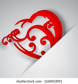 Big red heart with curls inserted into a cutout in a sheet of white paper