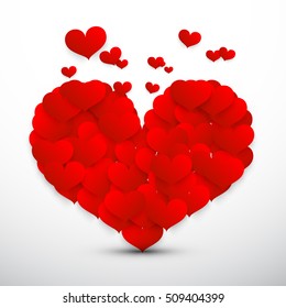 Big Red Heart Made from Small Flying Vector Hearts Isolated on Grey Background