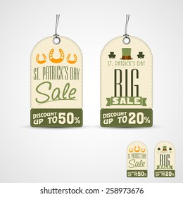 Grosses Sale-Tag oder Label-Design mit Rabatt auf grauem Hintergrund für Happy St. Patrick's Day Feier.