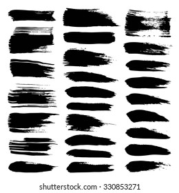 Big set of abstract  black textured strokes of dry paint on white background