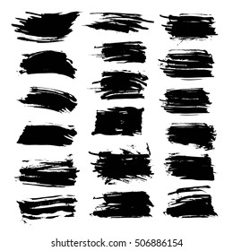 Big set of abstract textured black strokes isolated on a white background