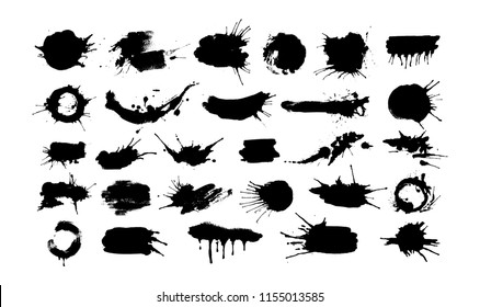 Big set of black ink splashes and drops made with brush. Blobs and spatters. Isolated vector illustration