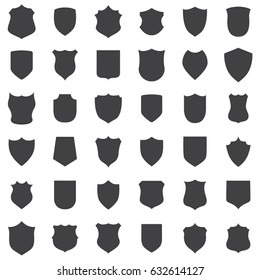 Big set of black shields on a white background