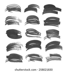 Big set brush strokes drawn in ink on white paper