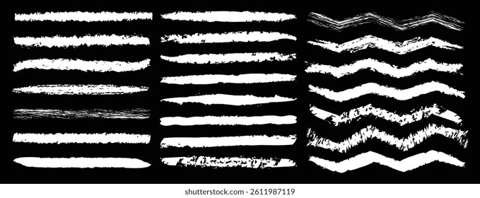 Big set of chalk brushes. Hand drawn grunge lines on chalkboard background can be used as art brushes.	