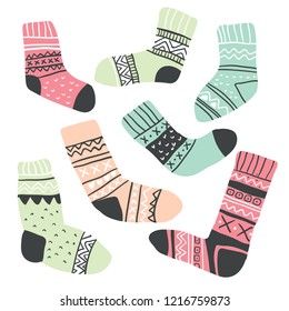 Big set of cute vector illustration hygge elements. Autumn and winter mood. Set of socks isolated on white background. Scandinavian style