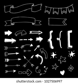 Big set of hand drawn white vector arrows.