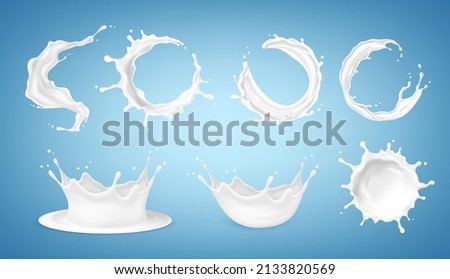 Big set of milk splashes isolated on blue background. Vector illustration