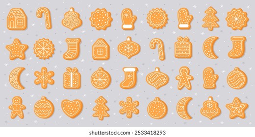 Big set of New Year's gingerbread cookies. Gingerbread man, house, christmas tree, candy, gift box, mitten, sock, snowflake, ball, heart. Homemade Christmas cookies with white sweet sugar glaze.