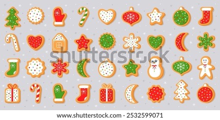 Big set of New Year's gingerbread cookies. Gingerbread man, house, christmas tree, candy, gift box, mitten, sock, snowflake, ball, heart. Homemade Christmas cookies with colorful sweet sugar glaze.