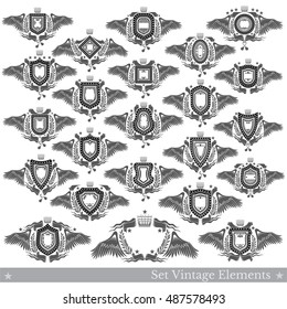 Big set of shields different forms with wings, wreath and vintage element. Vector heraldic design elements