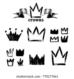 Big set silhouettes Crowns  Black grunge icons  Painted by hand and rough brush  Vector illustration  Isolated white background