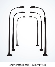 Big single iron led lit spotlight set on white backdrop. Freehand dark black ink outline hand drawn path public object sign icon banner in art doodle style pen on paper space for text. Closeup view